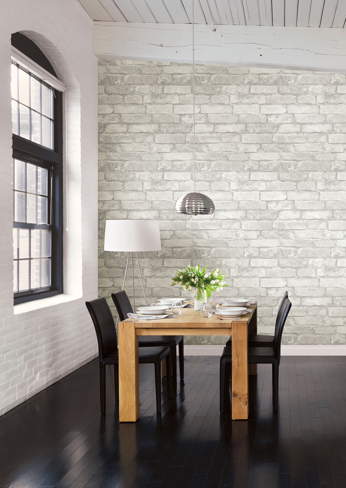 whitewashed brick loft dining room
