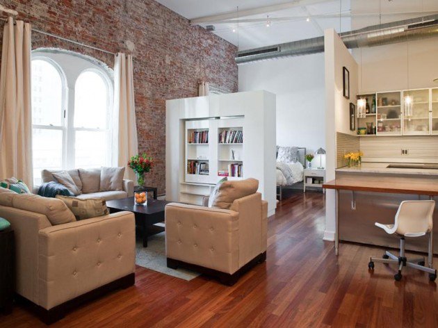 Loft with exposed brick and rotating wall