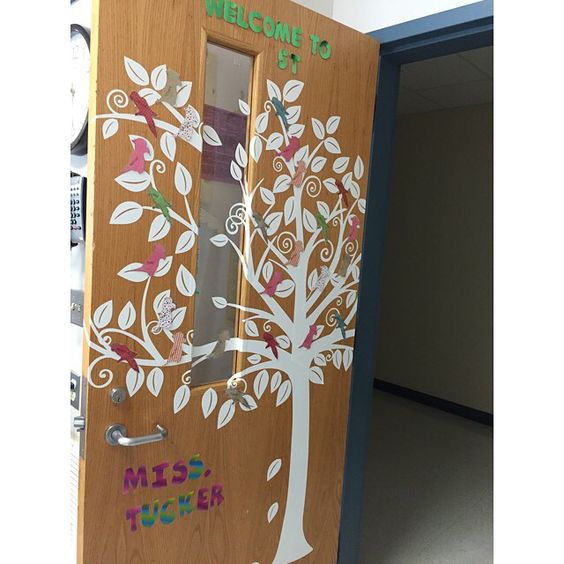 A tree decal decorates a classroom door